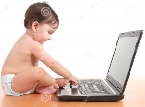 baby-typing-laptop-computer-keyboard-28598956